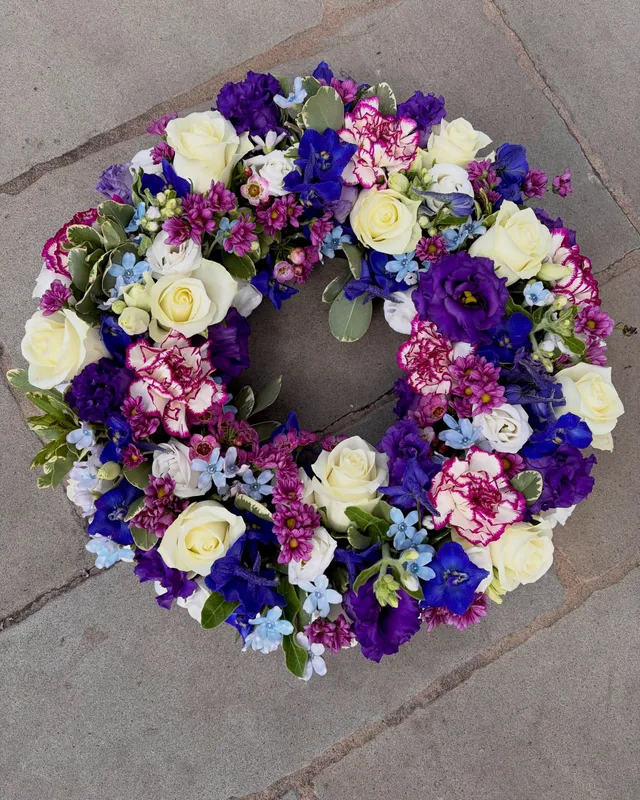 Funeral wreath in purple, blue and white